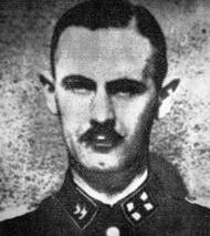 Velitel tábora SS-Oberscharführer Alfred Kuss, který obýval vilu pražských rekreantů.