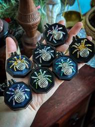 Přívěsky s pavouky