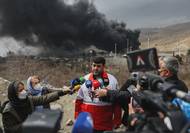 Následky útoku na palivové nádrže u Teheránu (snímky z 8. března 2026)